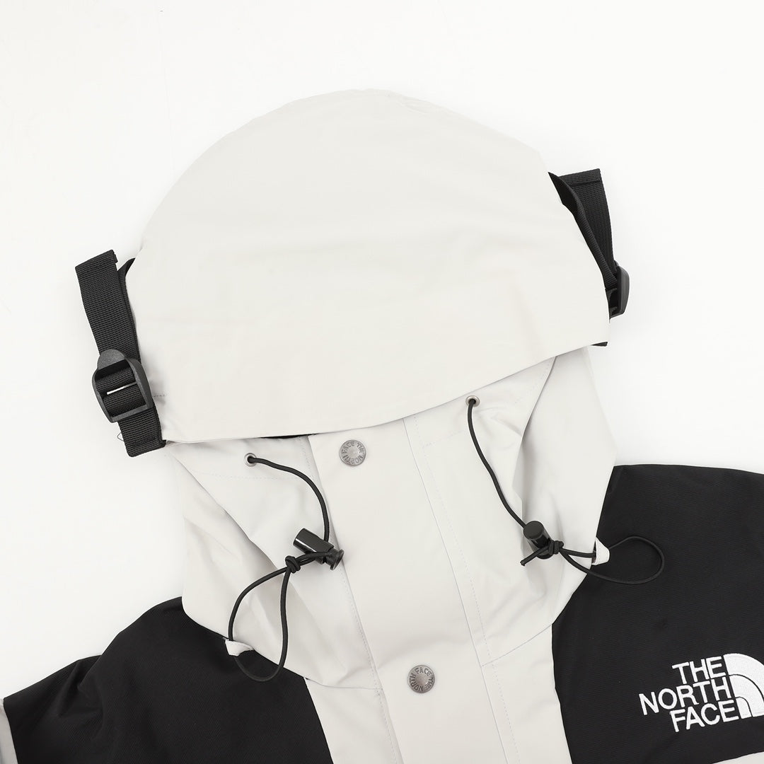 The North Face Women's Men's GORE-TEX Hooded Mountain Jacket - Off White & Black Color Block Waterproof Shell