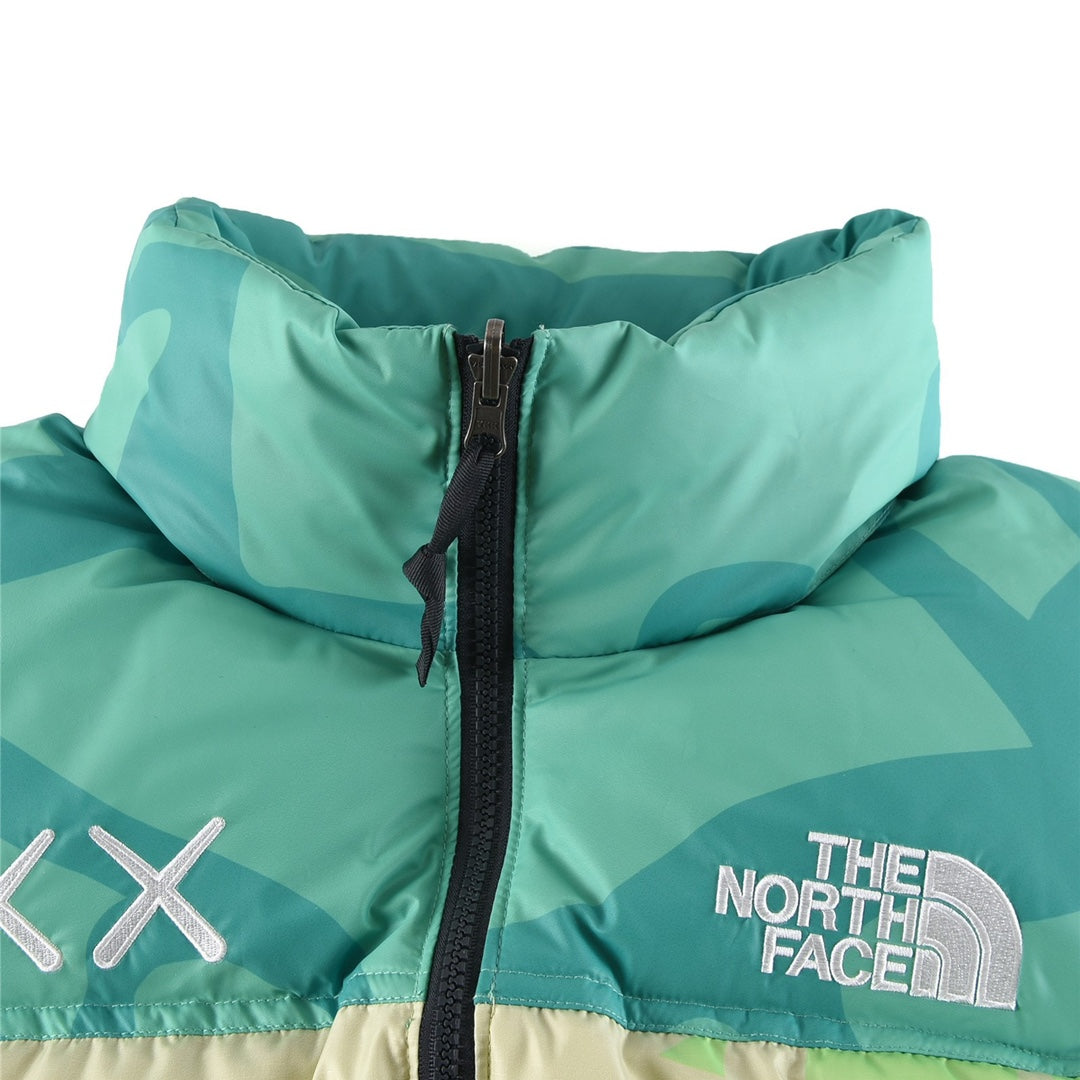 The North Face x KAWS 1996 Retro Nuptse Jacket Green Multi Camo