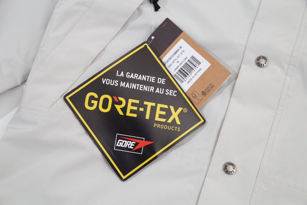 The North Face Men's GORE-TEX Hooded Mountain Jacket | Off-White & Black Color Block