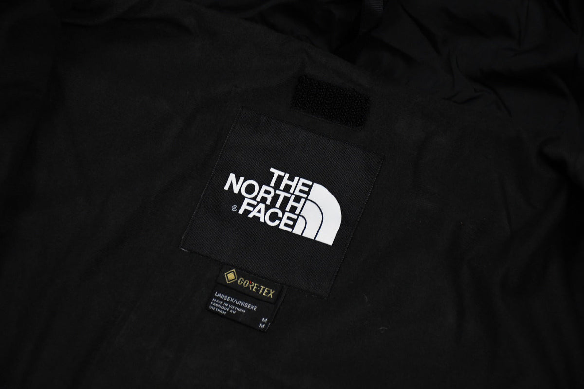 The North Face Men's GORE-TEX Hooded Mountain Jacket | Solid Black Outerwear