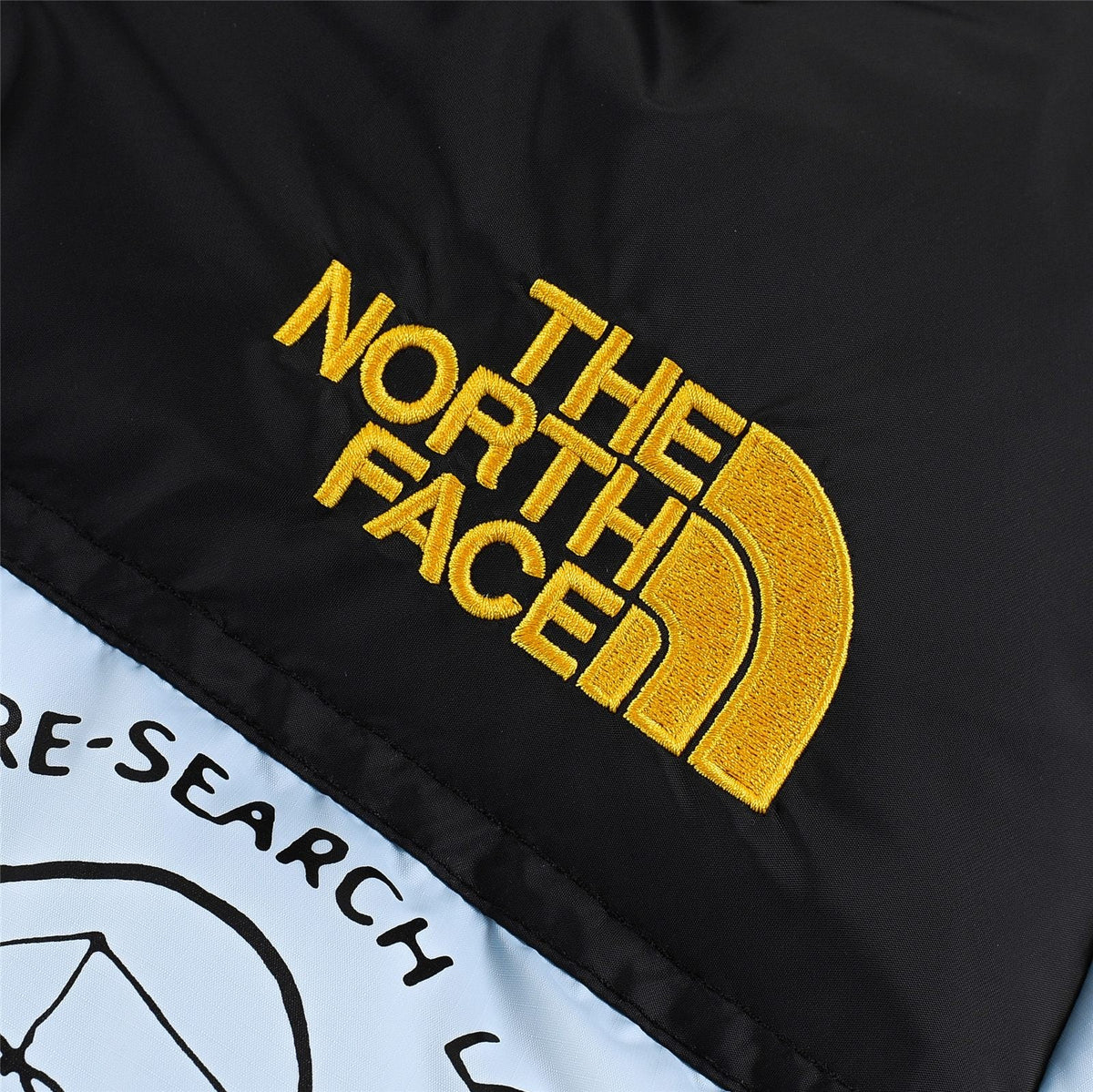 The North Face x Brain Dead Printed Puffer Jacket | Light Blue Color Block | Women's & Men's Streetwear