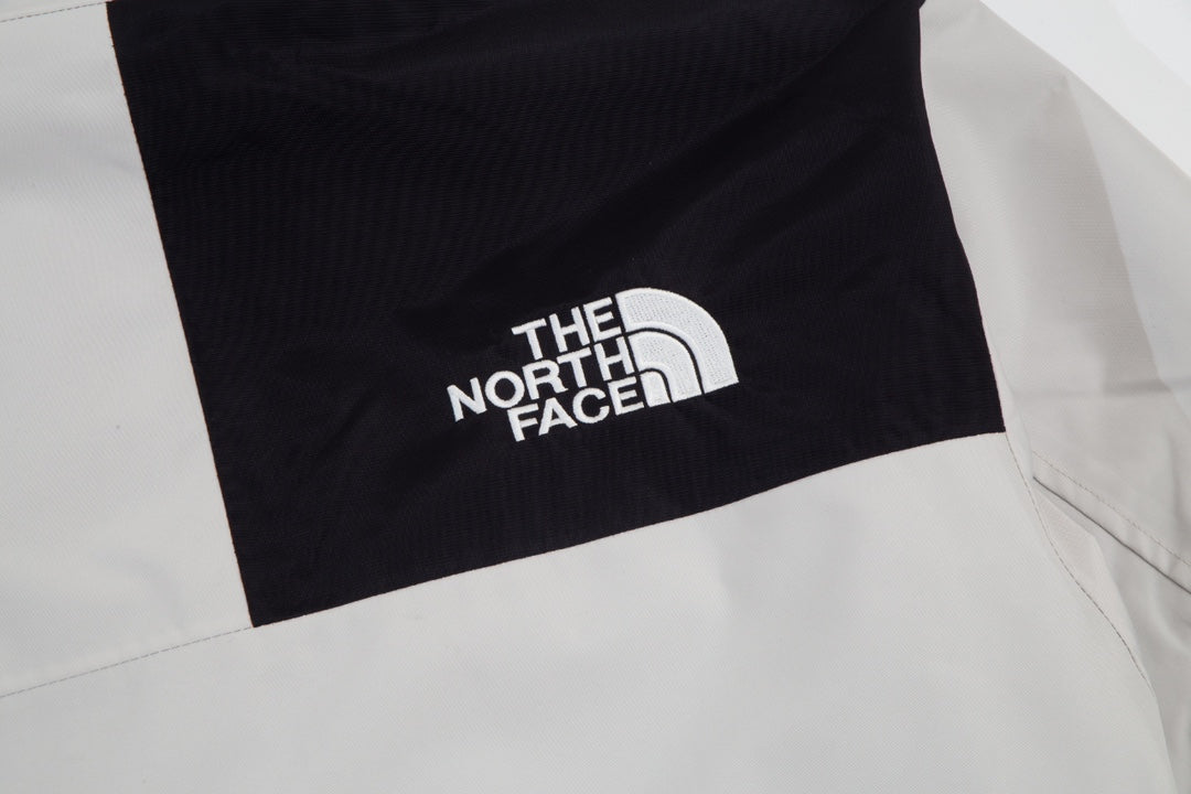 The North Face Men's GORE-TEX Hooded Mountain Jacket | Off-White & Black Color Block