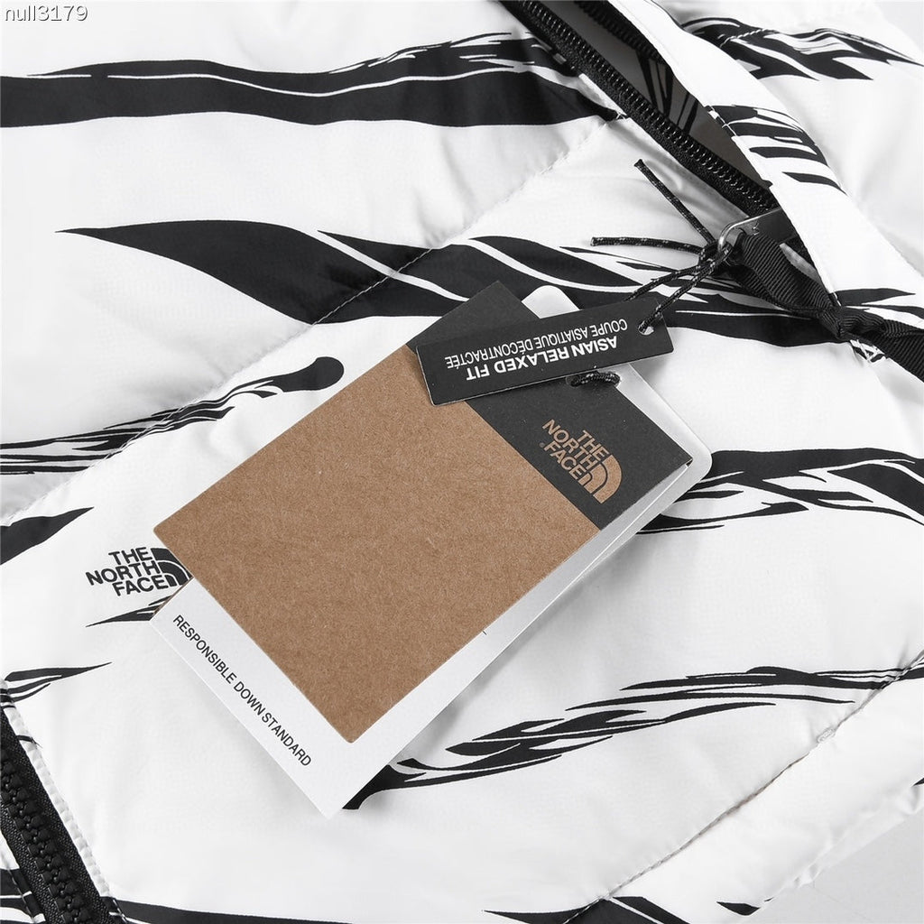 The North Face 1996 Retro Nuptse Jacket – White & Black Graphic Print | Women's & Men's Styling
