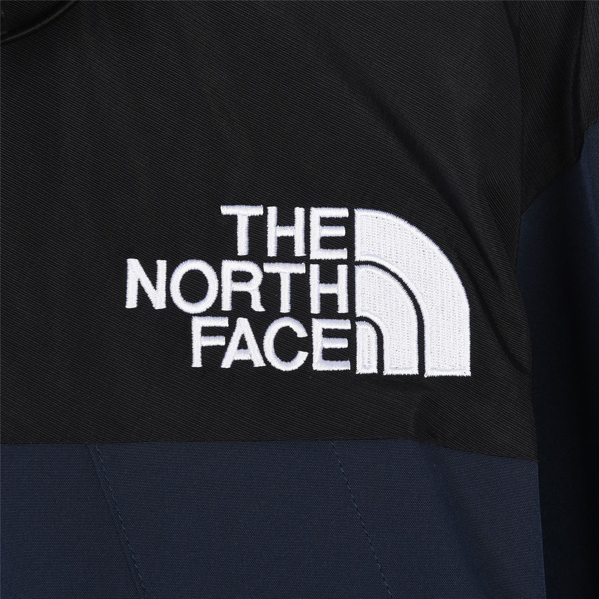 The North Face Men's Hooded Mountain Jacket | Navy Blue & Black Color Block