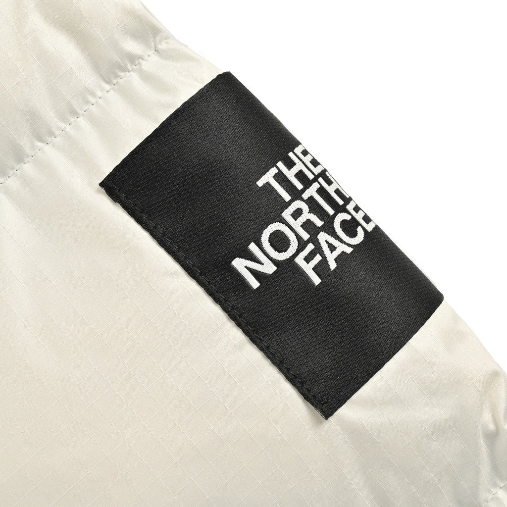 The North Face 1996 Retro Nuptse Jacket – Off White & Black Color Block | Women's & Men's Styling